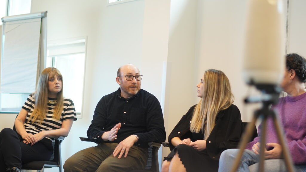 Group of people talking at a business meeting 