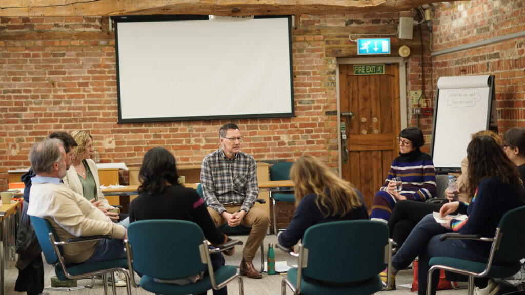 Tony talking with participants